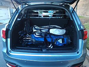 4 guys and 4 sets of clubs in the RDX??-h2mium5.jpg