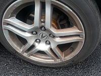 Rust (or brake dust) on the rim of the wheels..-tyre.png